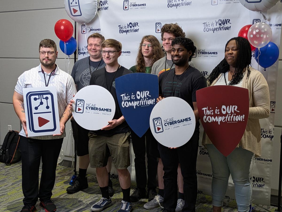 Winning students pose for photo at the NCAE-C Cyber Games.