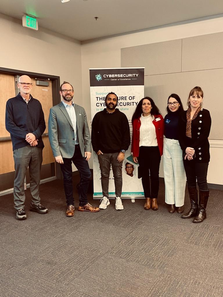 Conference facilitators at the cyber range workshop Highline Community College.